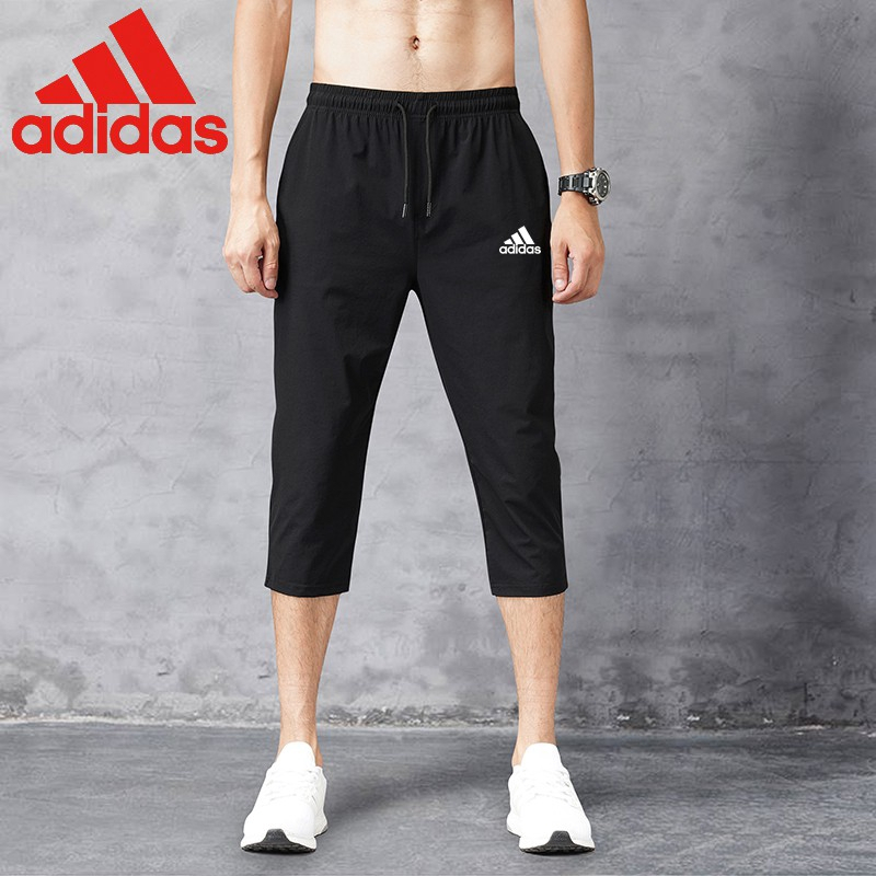 ! ️HOTSELLING! ️new solid color cropped trousers Capris men's casual pants with ice-like pants shorts